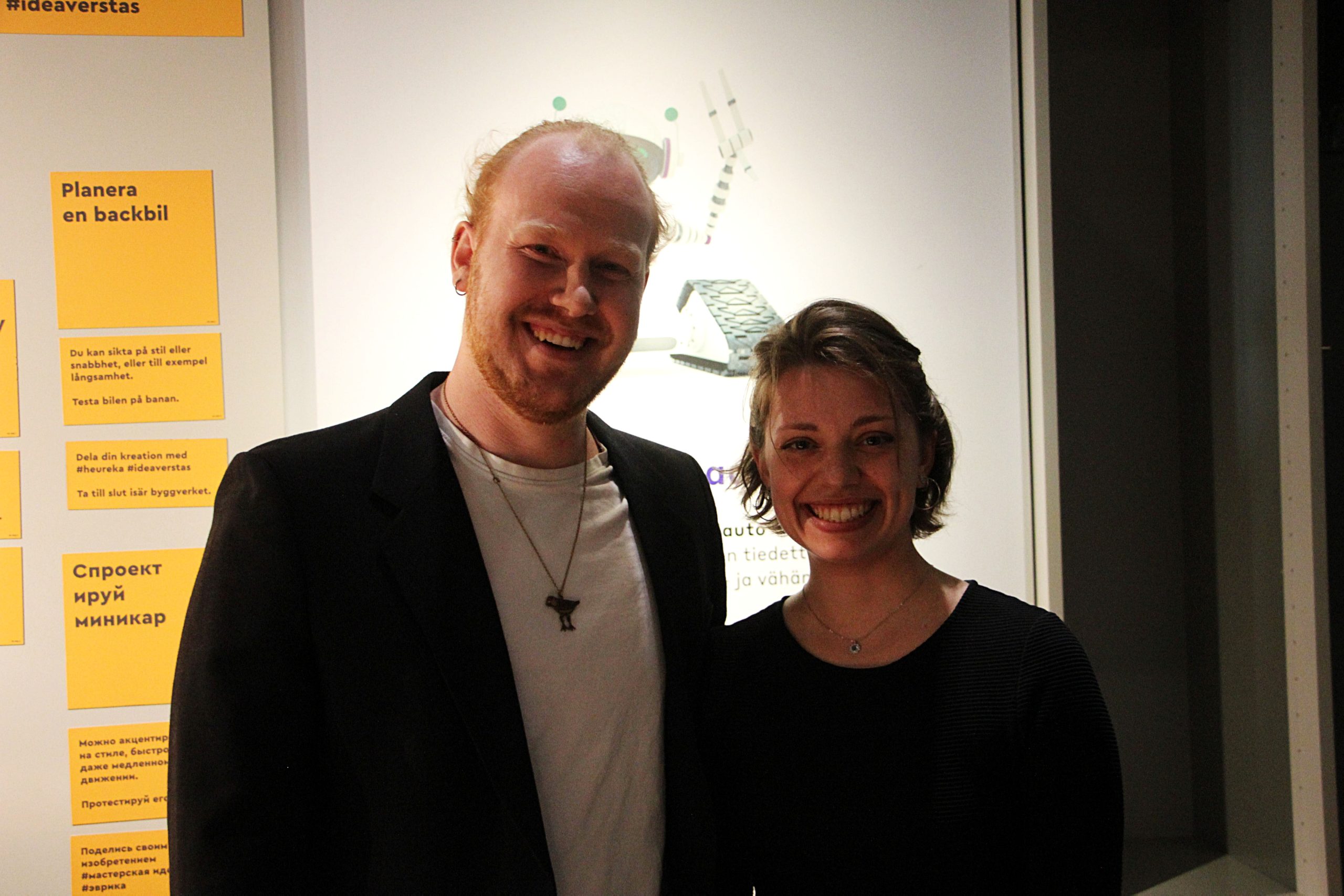 Two students from Aalto University, presenting their works at the exchibition.