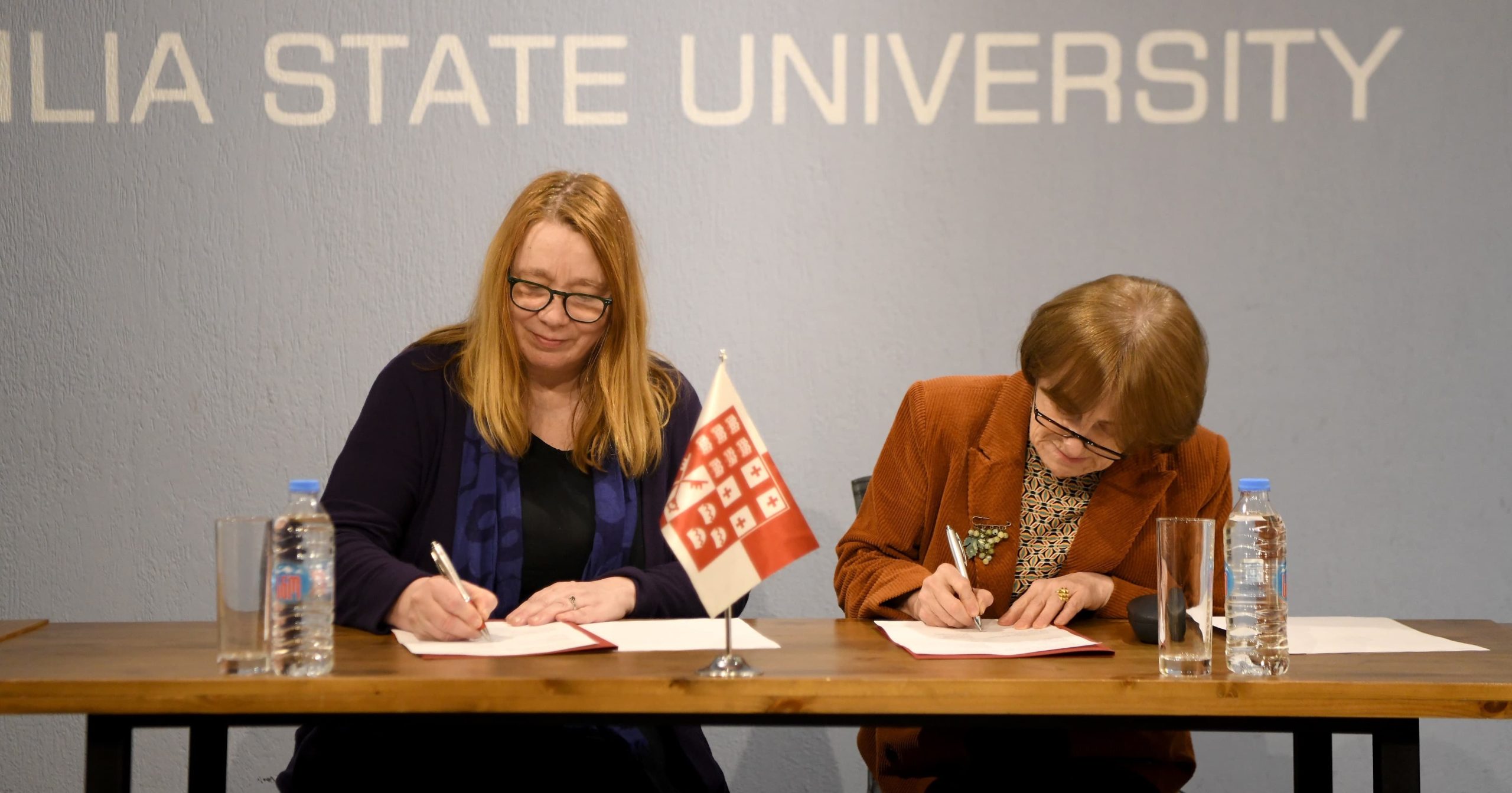 Maija Aksela signs Memorandum of Understanding with Ilia State University in Tbilisi, Georgia.
